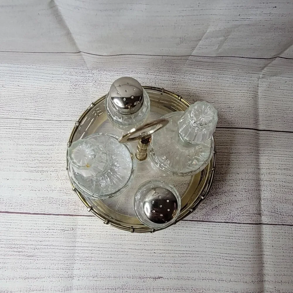 Vintage brass salt, pepper, vinegar, and oil jars with holder table-centerpiece
